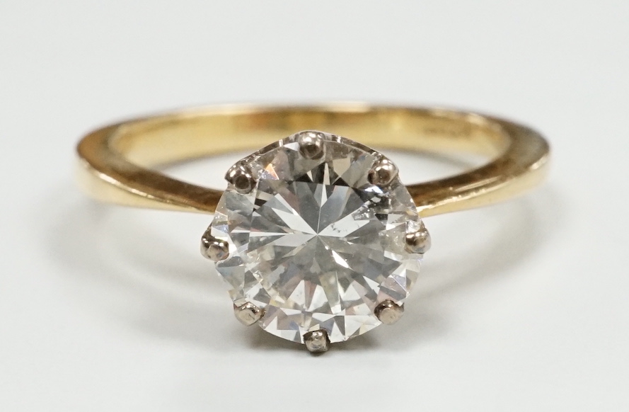 A yellow metal and solitaire diamond set ring, size K/L, gross weight 3.3 grams